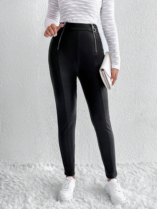 Essnce Pantalones ajustados cremallera con diseno de aro O