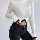 Essnce Jersey crop cuello alto de manga raglan bajo asimetrico