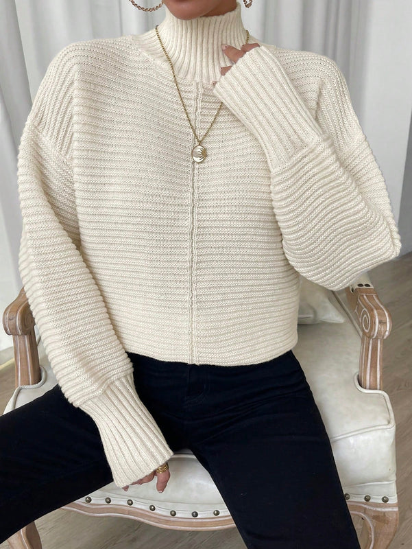 Essnce Jersey de cuello cisne de hombros caidos bajo con abertura