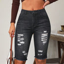 Shorts en mezclilla bajo crudo con lavado ligero