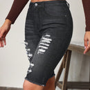 Shorts en mezclilla bajo crudo con lavado ligero
