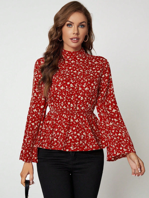 Clasi Blusa peplum con estampado floral de manga con volante