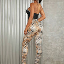 SXY Pantalones ajustados con estampado de piel de serpiente bajo con abertura