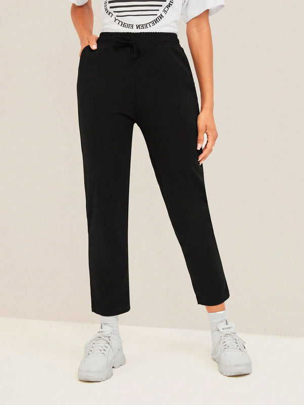 Pantalones unicolor de cintura con cordon crop