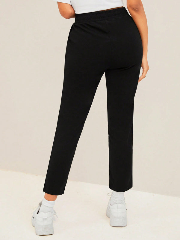Pantalones unicolor de cintura con cordon crop