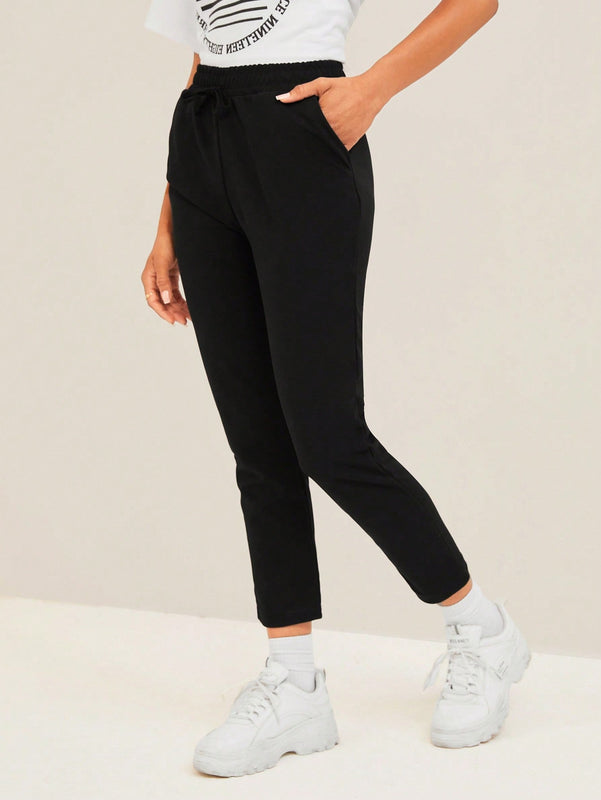 Pantalones unicolor de cintura con cordon crop
