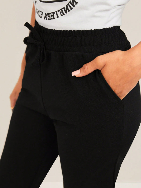 Pantalones unicolor de cintura con cordon crop