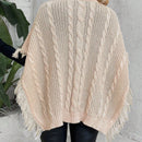 LUNE Poncho cuello alto ribete con fleco tejido de cable