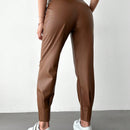 Pantalones con punos elasticos y cintura con cordon de color liso para mujer