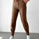 Pantalones con punos elasticos y cintura con cordon de color liso para mujer