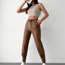 Pantalones con punos elasticos y cintura con cordon de color liso para mujer