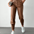 Pantalones con punos elasticos y cintura con cordon de color liso para mujer