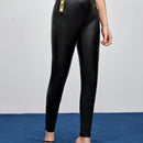 Pantalones pitillo de cuero PU con detalle de botones