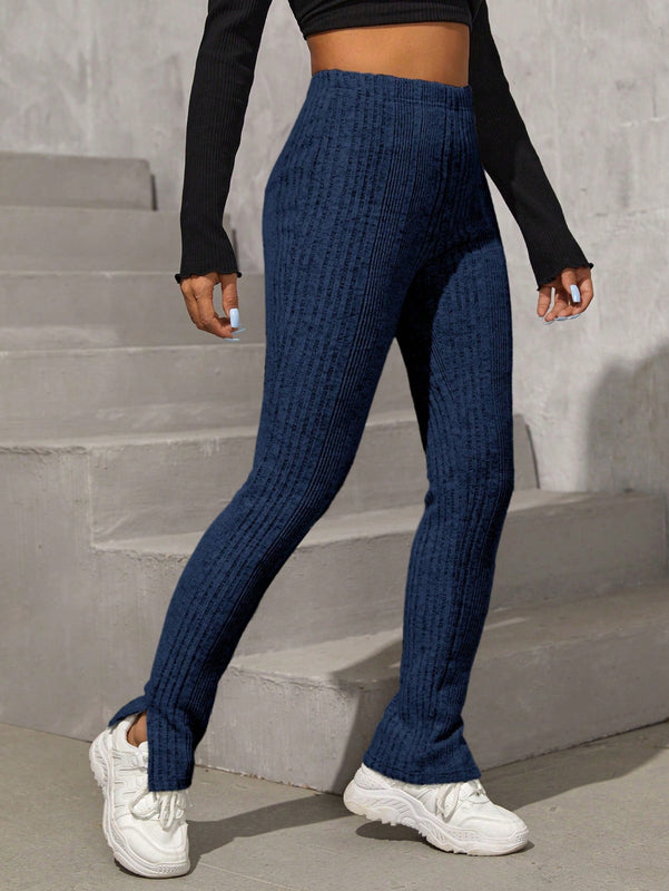 Pantalones con dobladillo dividido y cintura alta
