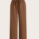 Pantalones sueltos de pierna ancha de color solido para mujer con dobladillo fluido, estilo casual