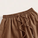 Pantalones sueltos de pierna ancha de color solido para mujer con dobladillo fluido, estilo casual