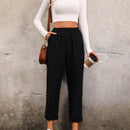 Pantalones unicolor con bolsillo oblicuo de cintura elastica