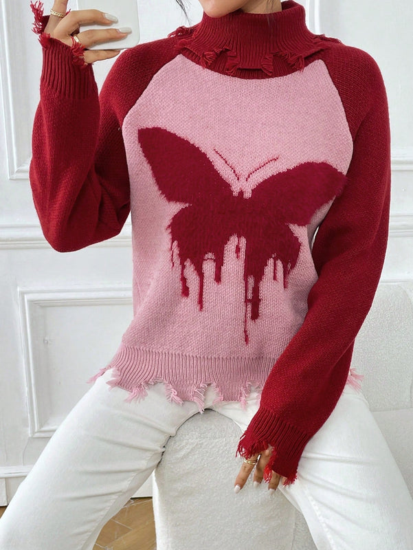 Essnce Sueter roto con patron de mariposa cuello alto de manga raglan