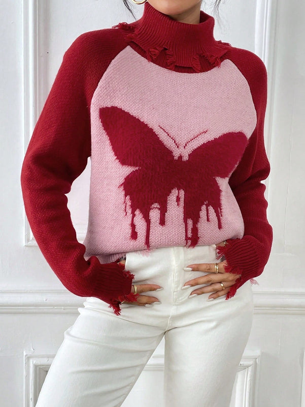 Essnce Sueter roto con patron de mariposa cuello alto de manga raglan