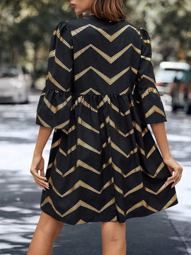 Vestido con estampado de cheuron con cremallera cuarta de manga farol