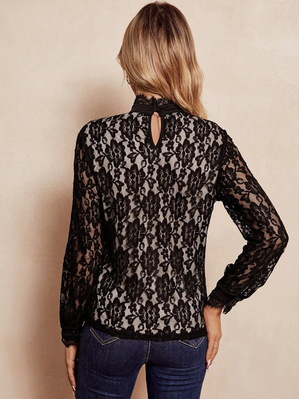 Clasi Blusa de cuello alto con encaje