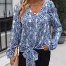 LUNE Blusa con estampado bajo con nudo