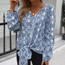 LUNE Blusa con estampado bajo con nudo