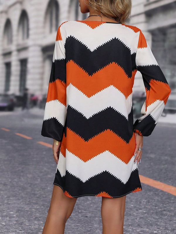 Vestido tunico con estampado de cheuron de manga farol