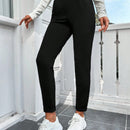 Pantalones ajustados unicolor de cintura con estampado de letra