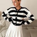 Cardigan holgado con botones frontales y hombros caidos, adecuado para otono e invierno, para mujer