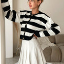 Cardigan holgado con botones frontales y hombros caidos, adecuado para otono e invierno, para mujer