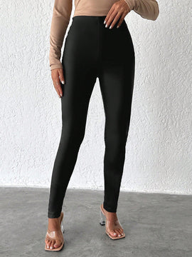 Pantalones ajustados unicolor de talle alto