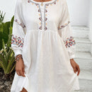 Vestido smock con bordado floral de manga farol