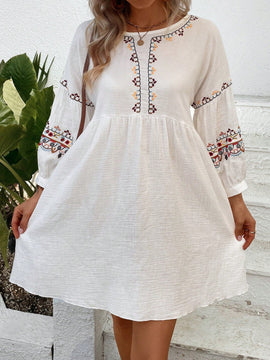 Vestido smock con bordado floral de manga farol