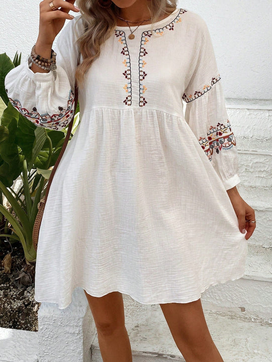 Vestido smock con bordado floral de manga farol