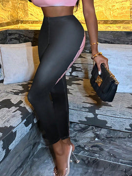 Pantalones ajustados con estampado geometrico