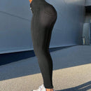 Pantalones ajustados con mosca de boton