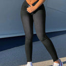 Pantalones ajustados con mosca de boton