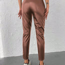 Pantalones conicos casuales con diseno de botones de color liso