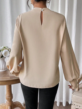 Frenchy Blusa unicolor girante delantero de manga obispo