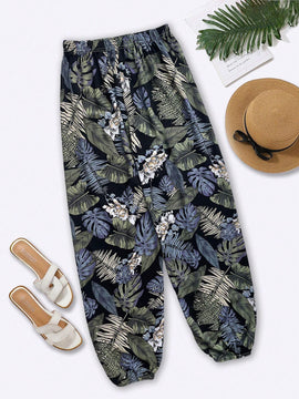 VCAY Pantalones zanahoria con estampado tropical