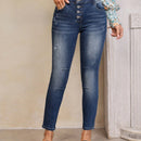 LUNE Jeans ajustados con rasgunos de gato con boton