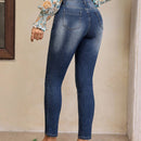 LUNE Jeans ajustados con rasgunos de gato con boton