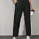 Pantalones unicolor con bolsillo oblicuo de cintura con cordon