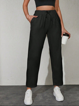 Pantalones unicolor con bolsillo oblicuo de cintura con cordon
