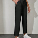 Pantalones unicolor con bolsillo oblicuo de cintura con cordon