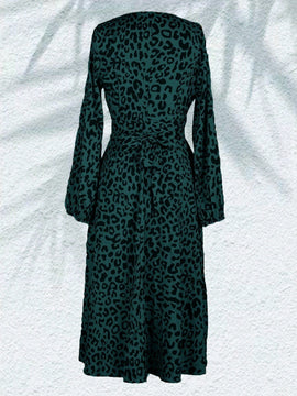 Vestido con estampado de lunares de manga farol cruzado con nudo lateral