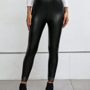 Pantalones ajustados unicolor cortado laser cuero PU