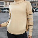 Essnce Jersey con patron de rayas cuello alto de manga raglan bajo con abertura