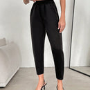 Pantalones conicos unicolor de cintura elastica